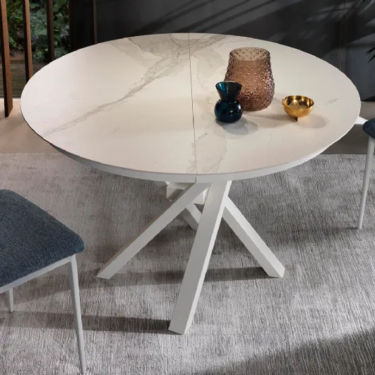 Tavolo allungabile Shangai Round con top in ceramica e base in alluminio verniciato di Riflessi